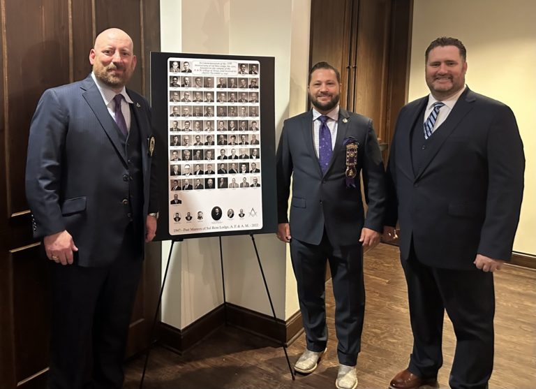 Past Masters Josh Reinbolt and Bobby Rogenbuck get at picture with The Grand Master of Texas Brad Billings at the 75th Anniversary Celebration.